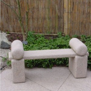 Japanese roll top stone bench with arm rests